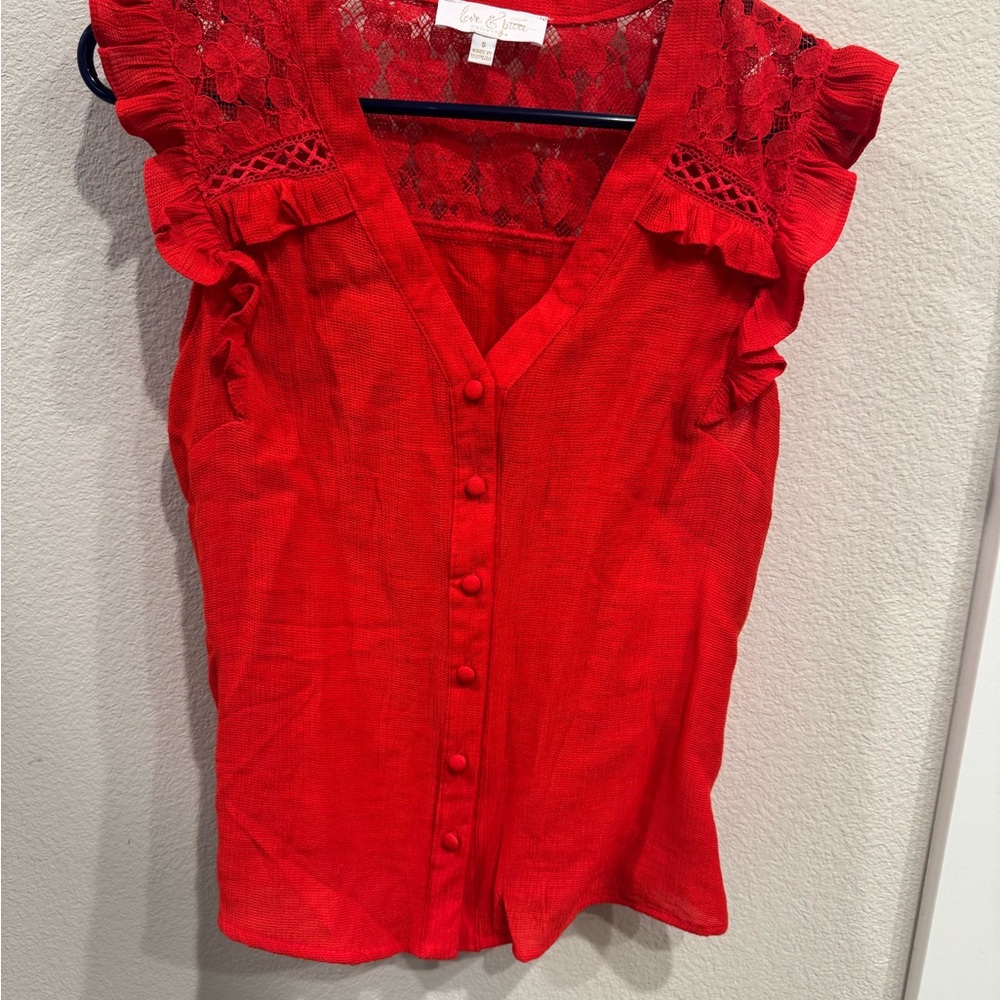 Lace sleeveless top with ruffles